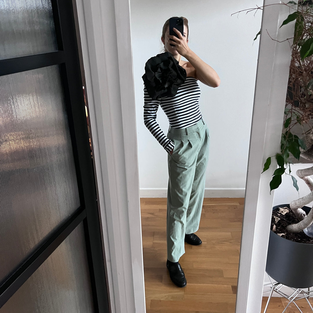 Striped One Sleeve Top With Black Flower Pin