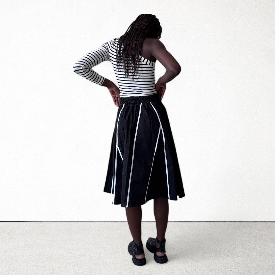 Black Skirt With Panels And White Contrast Tape