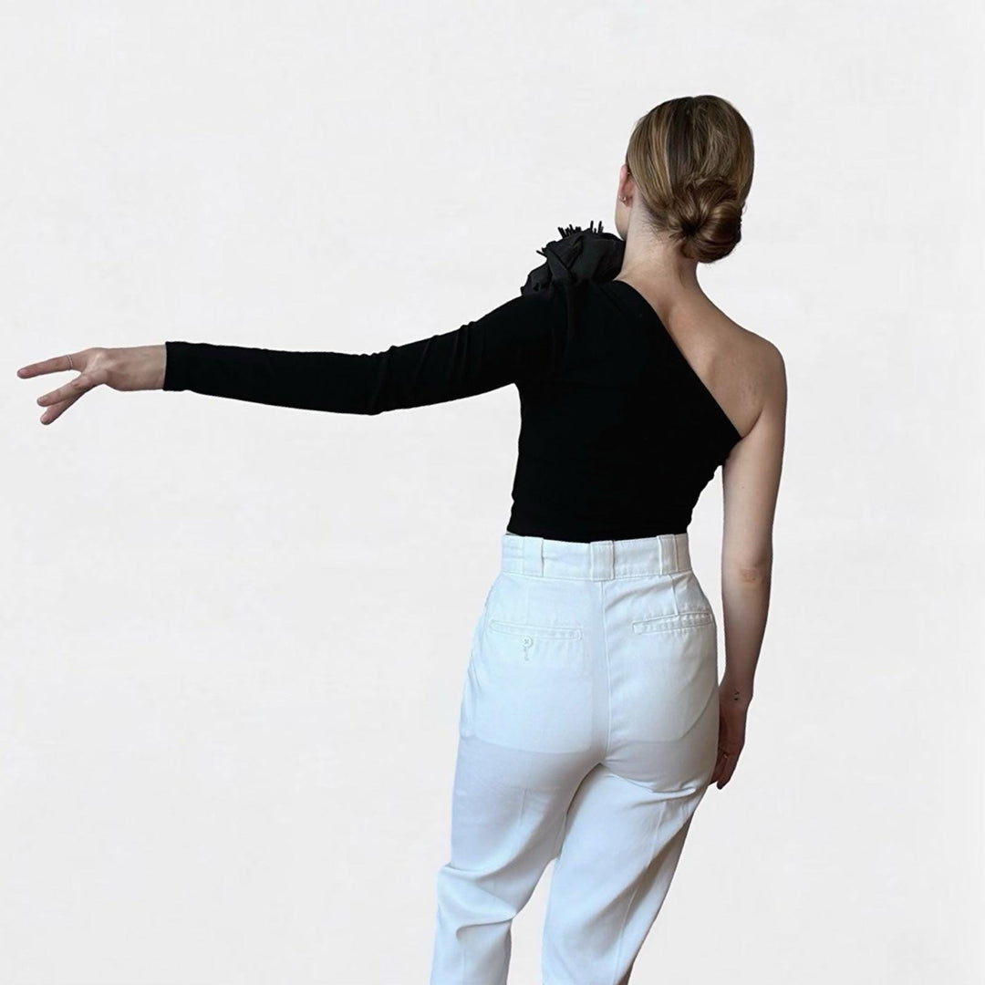 Black one sleeve top with black flower pin