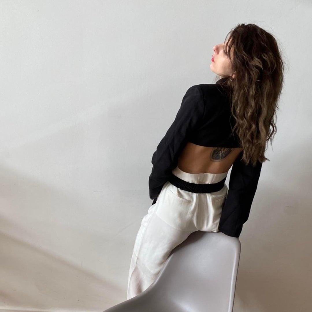 Reworked black blazer with wrap detail and cut out back