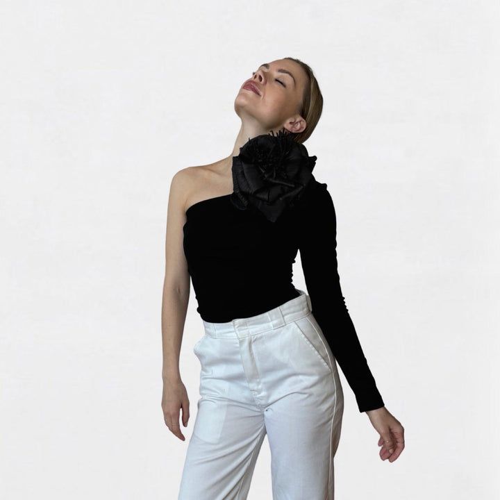 Black one sleeve top with black flower pin