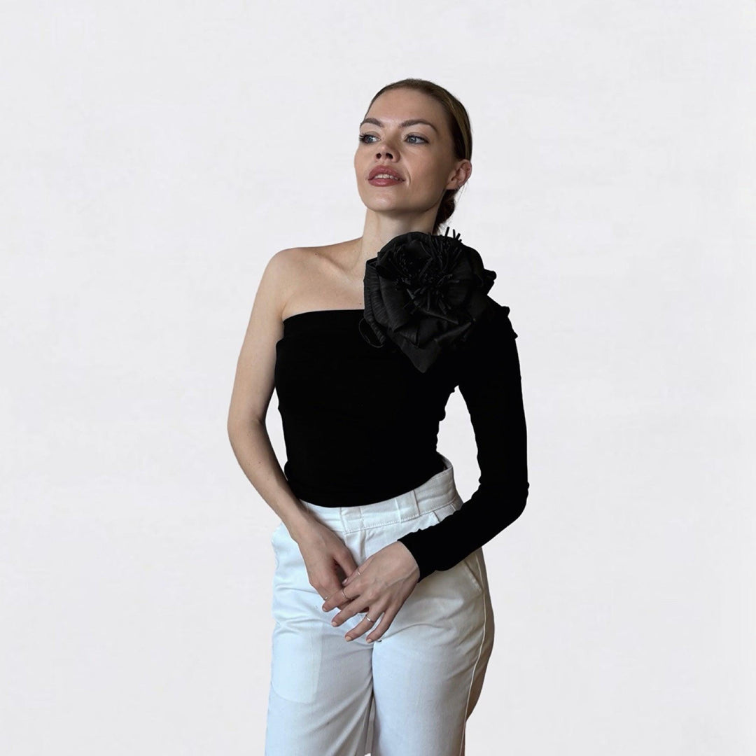 Black one sleeve top with black flower pin