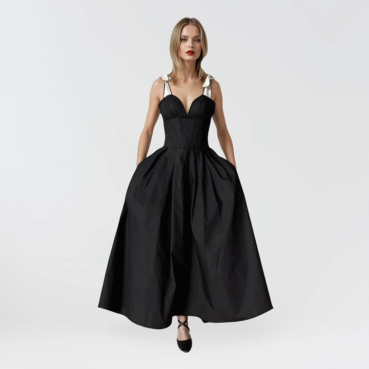 Black corset dress with contrasting trap ties