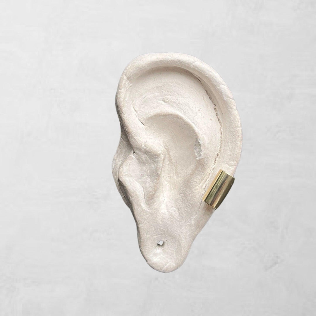 Gold earlobe cuff earring one piece