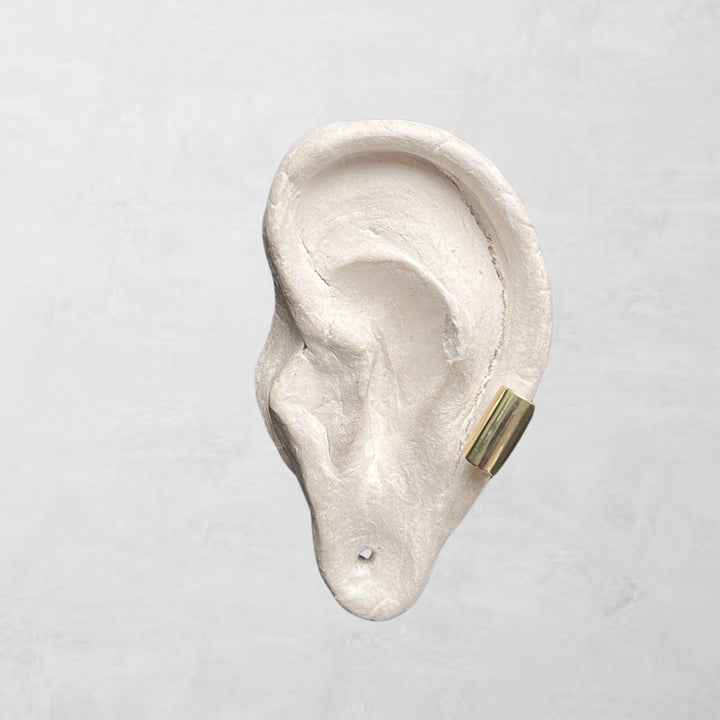 Gold earlobe cuff earring one piece