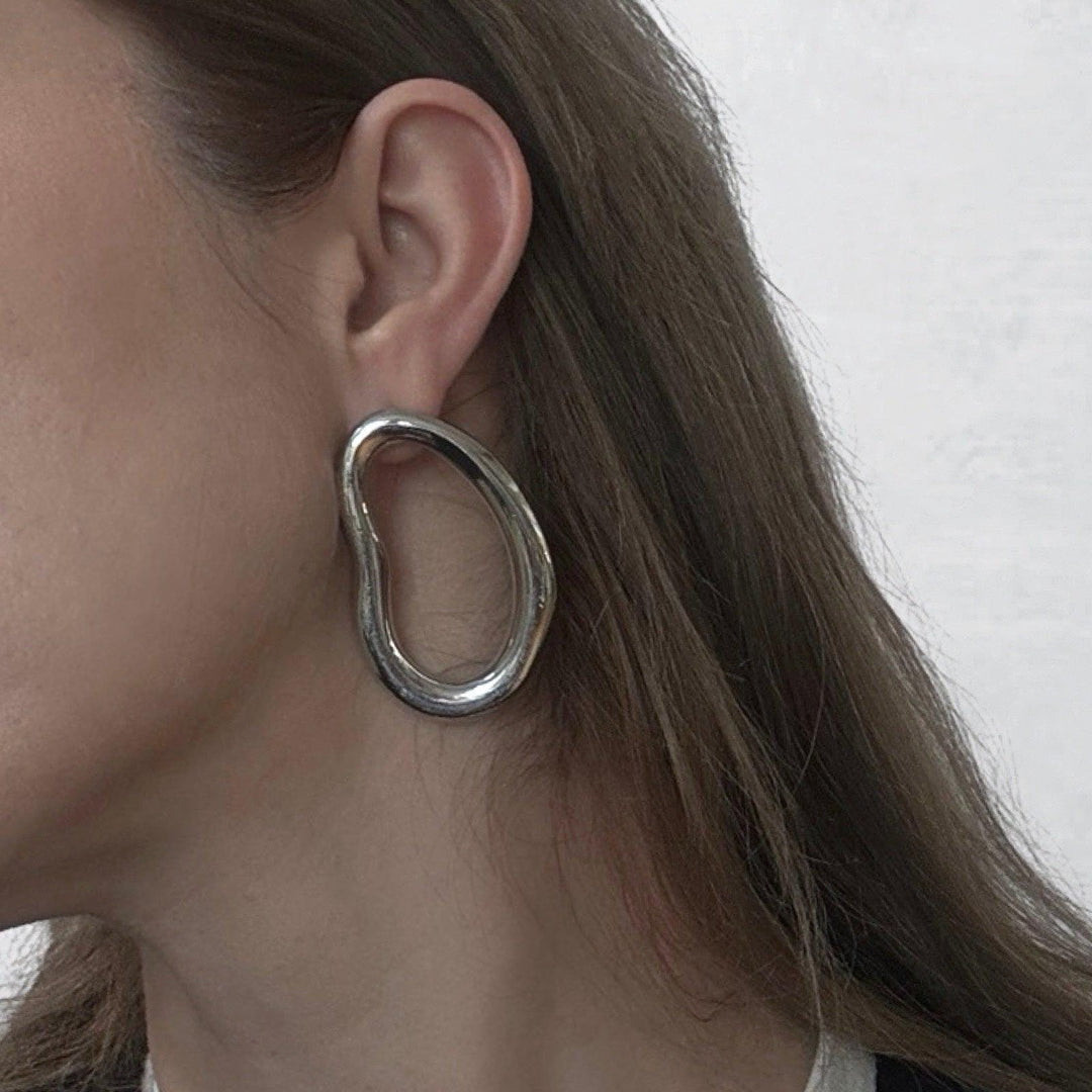 Minimalist asymmetric silver hoop earrings