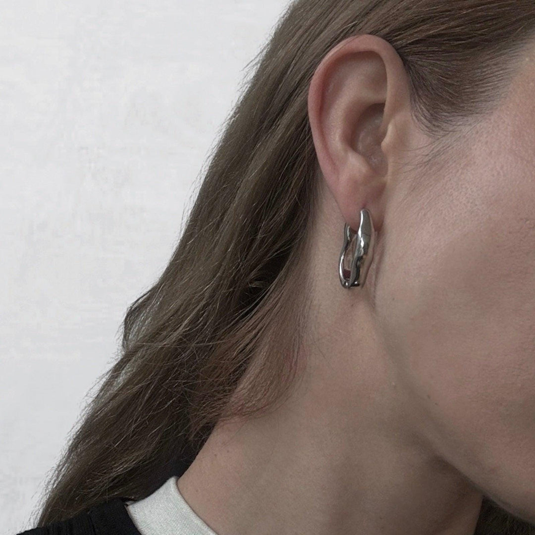 Minimalist asymmetric silver hoop earrings