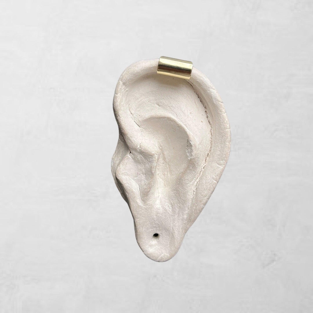 Gold earlobe cuff earring one piece