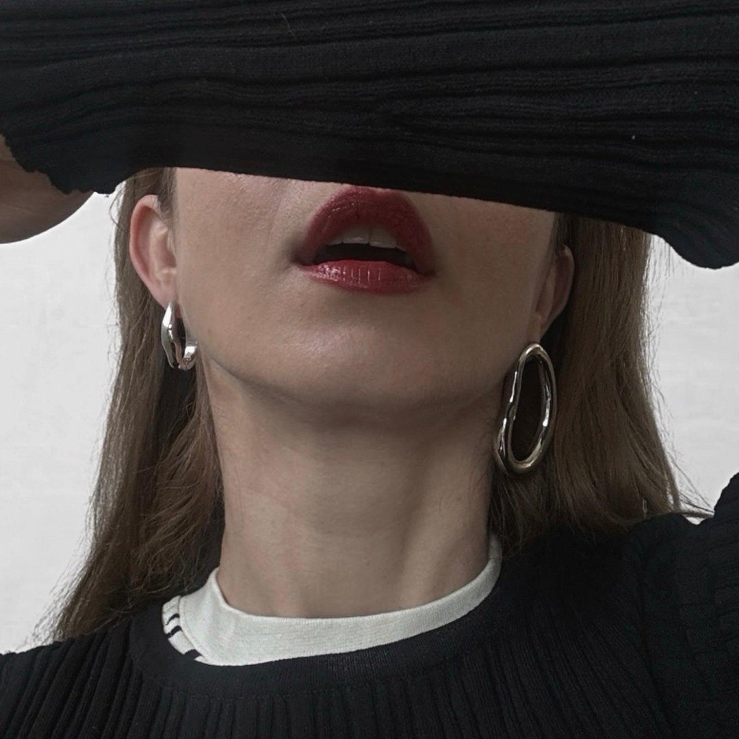 Minimalist asymmetric silver hoop earrings