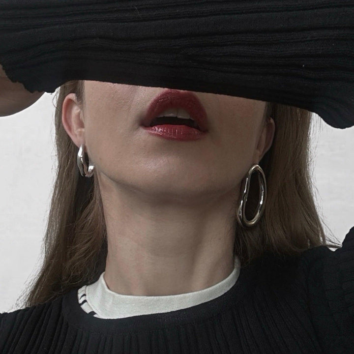 Minimalist asymmetric silver hoop earrings