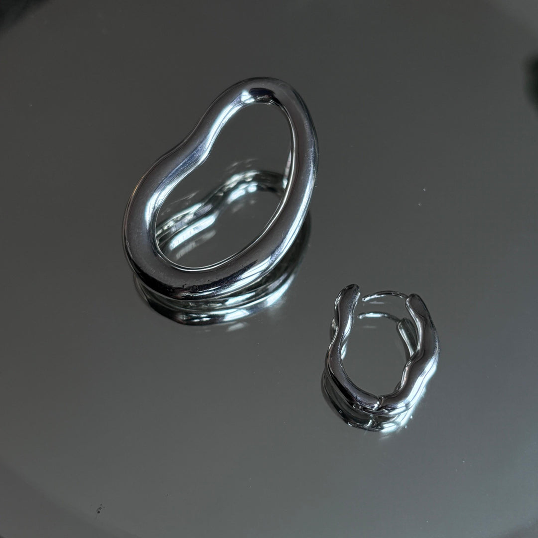 Minimalist asymmetric silver hoop earrings