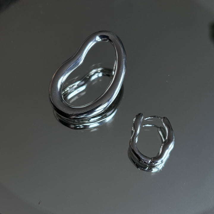 Minimalist asymmetric silver hoop earrings