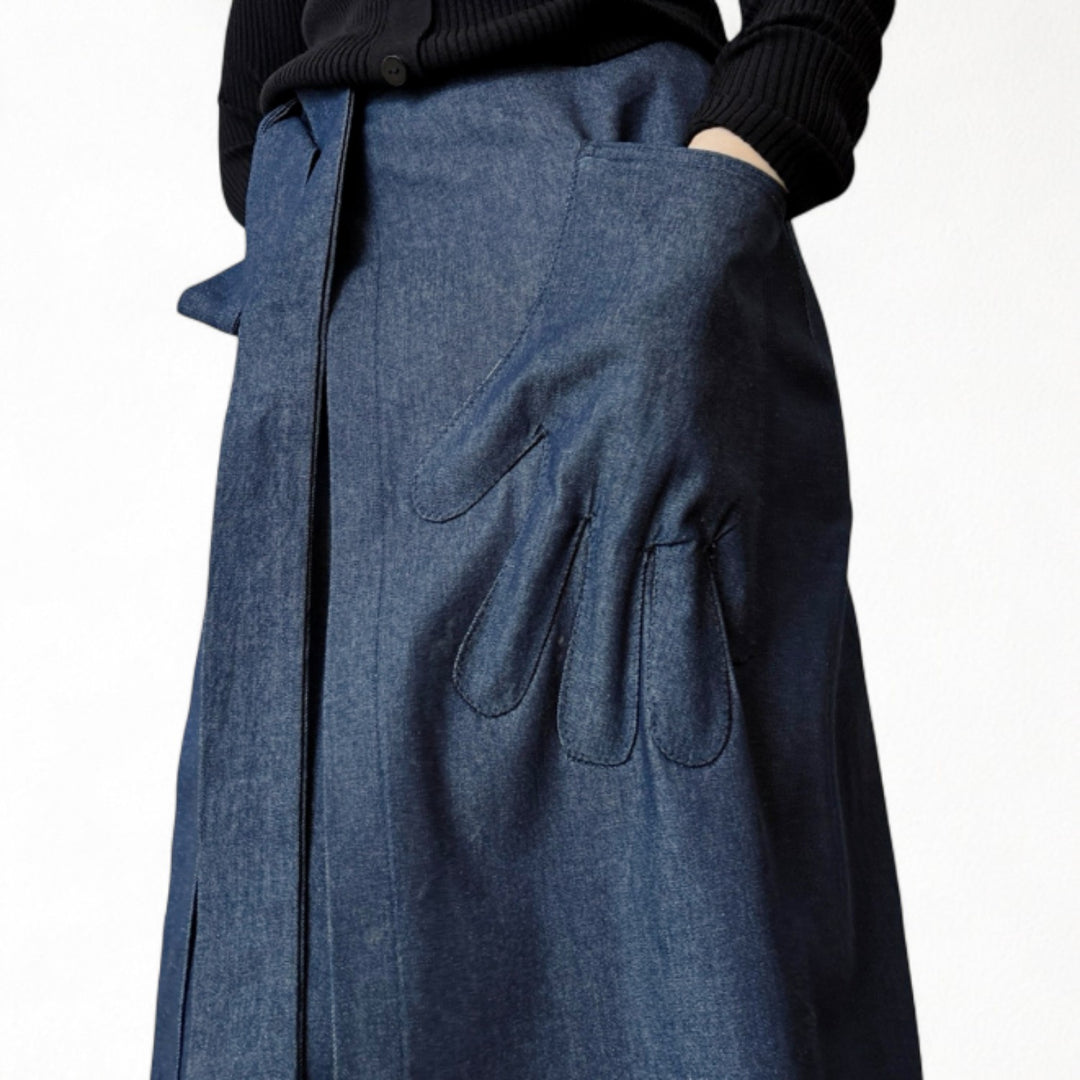 Denim wrap skirt with hand shaped appliqué pocket