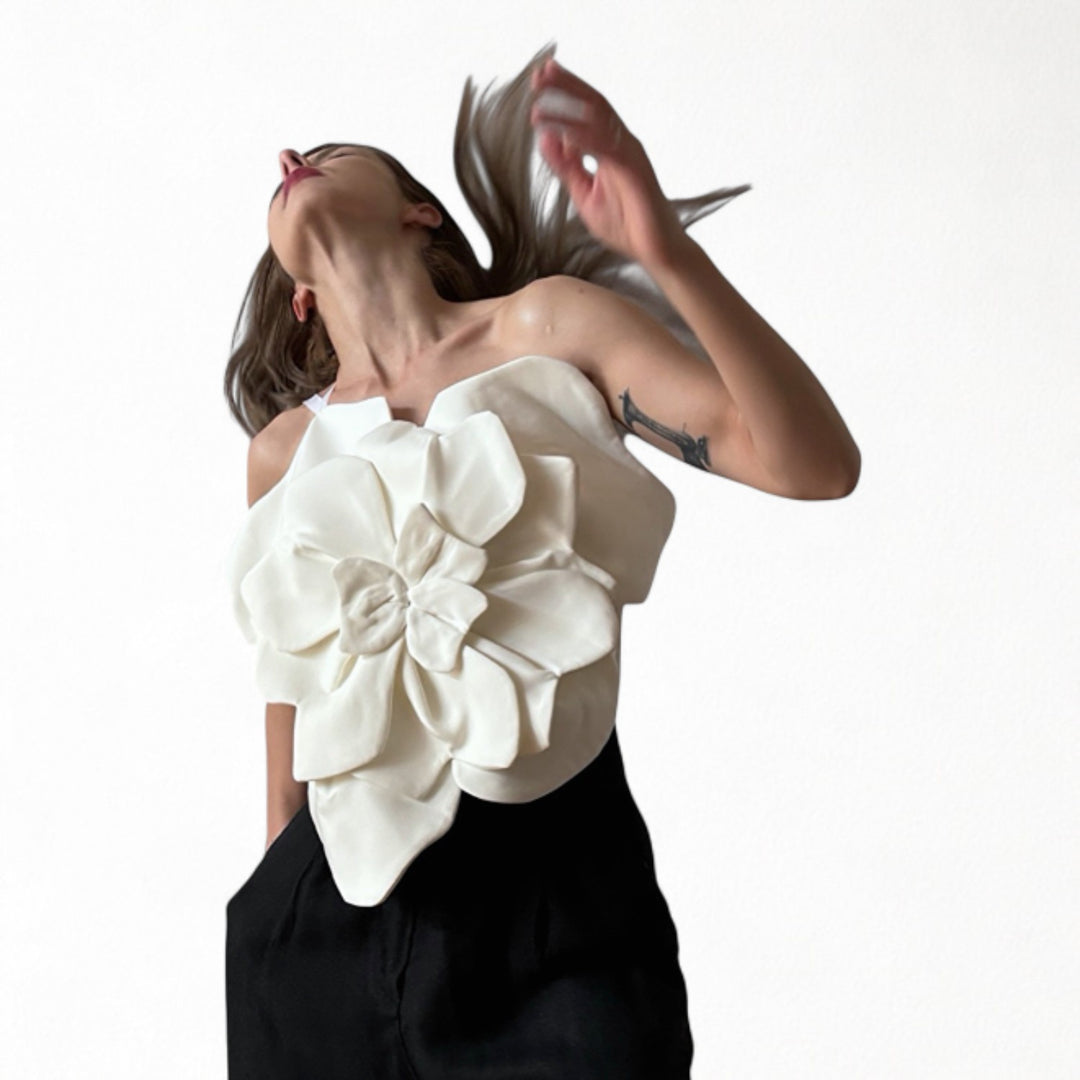 White flower top with asymmetric strap and criss cross back