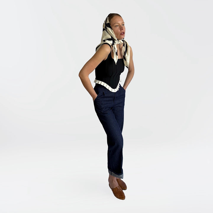Black rib knit corset top with ruffle
