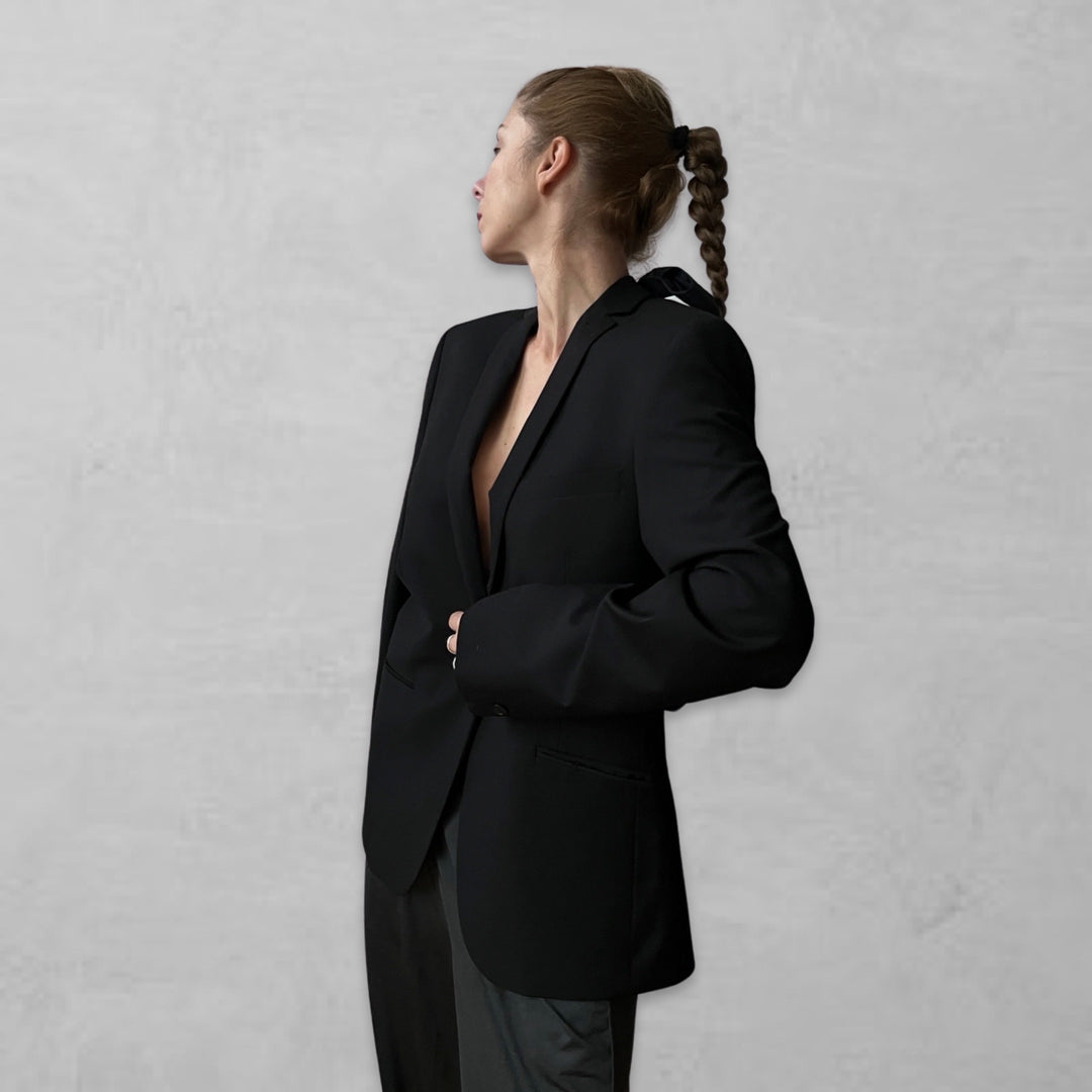 Reworked black blazer with open back and black bows