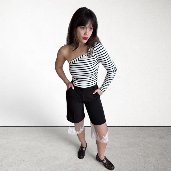 Striped one sleeve top with metal brooch