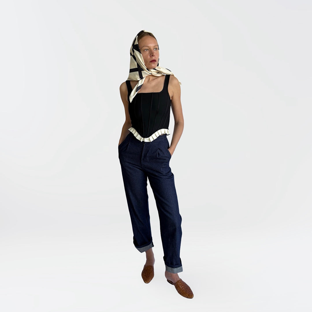 Black rib knit corset top with ruffle