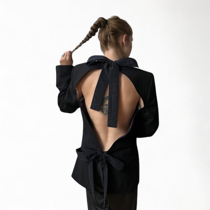 Reworked black blazer with open back and black bows