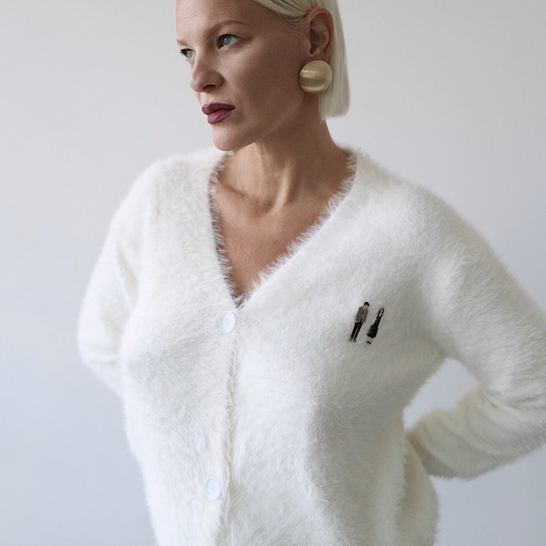 Beige fuzzy knit cardigan with embroidery patchess