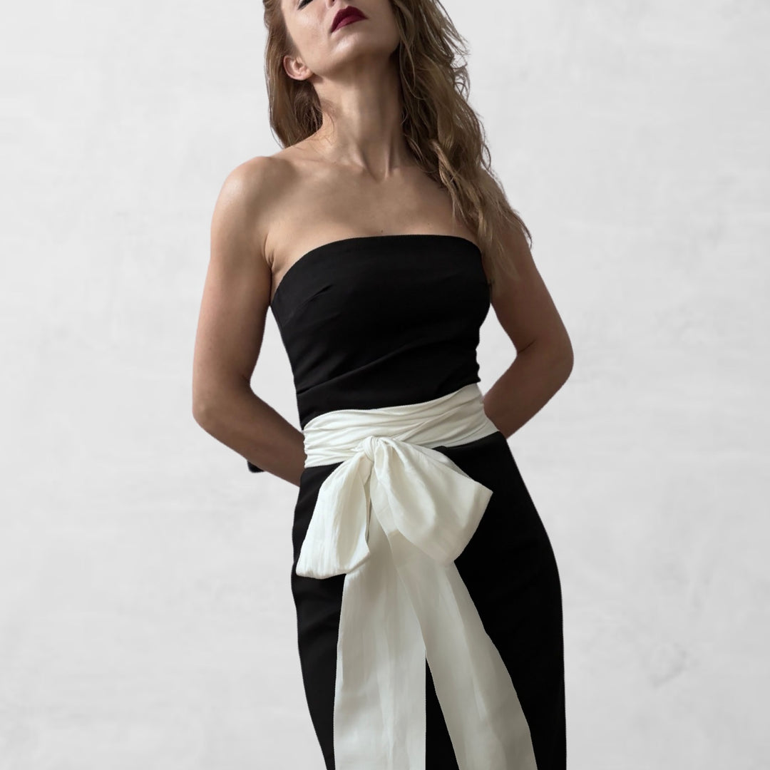 Black strapless dress with white ties