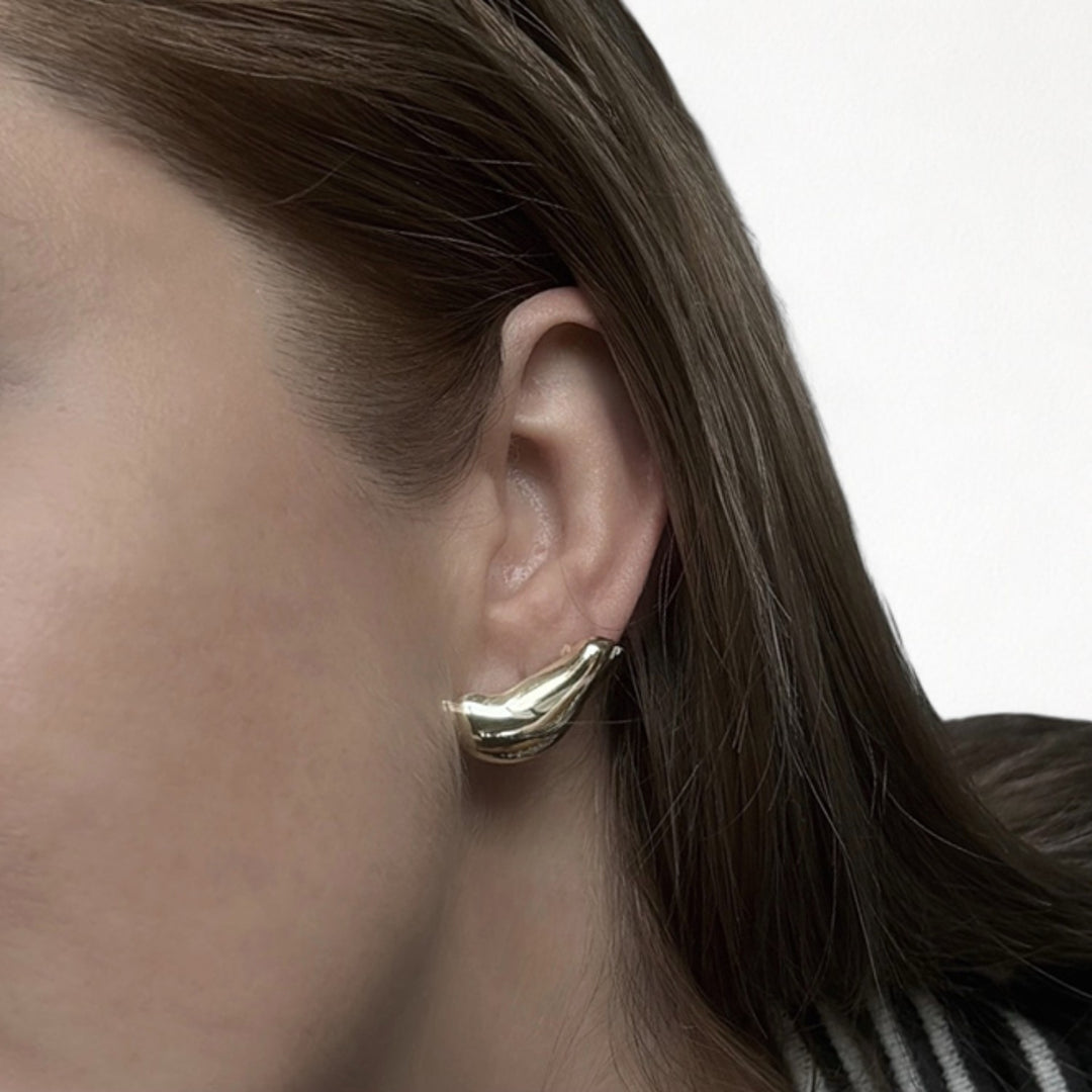 Gold earlobe cuff earrings