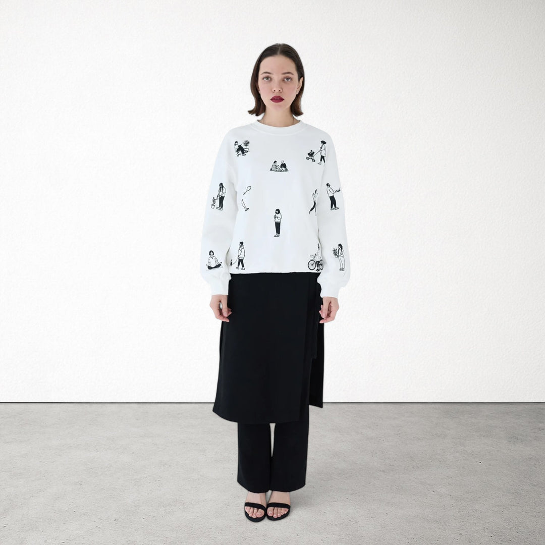 White heavyweight jumper with people embroidery