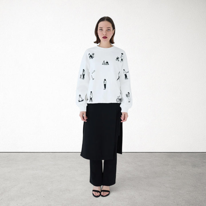 White heavyweight jumper with people embroidery