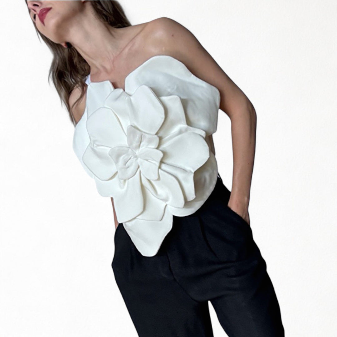 White flower top with asymmetric strap and criss cross back