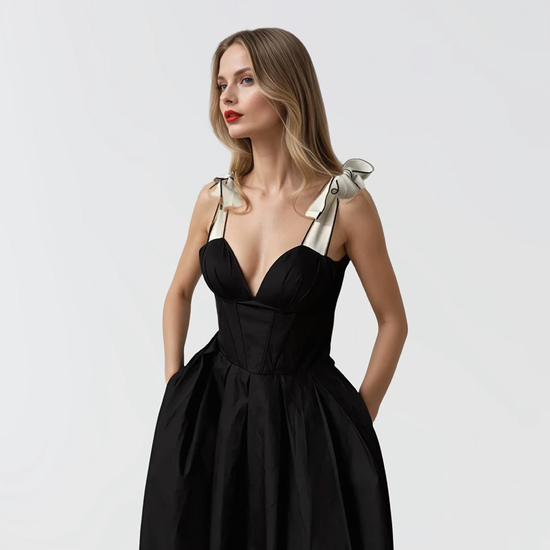 Black corset dress with contrasting trap ties