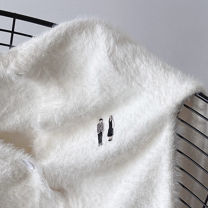 Beige fuzzy knit cardigan with embroidery patchess