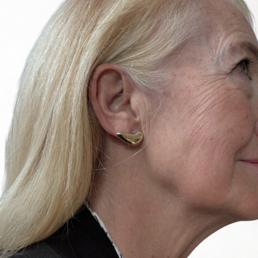 Gold earlobe cuff earrings