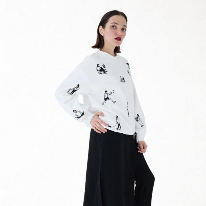 White heavyweight jumper with people embroidery
