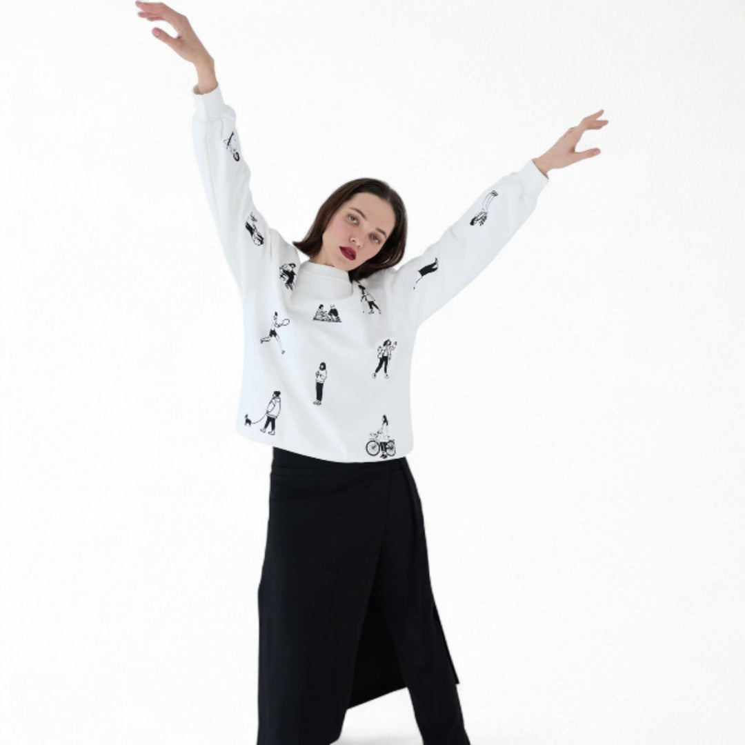 White heavyweight jumper with people embroidery