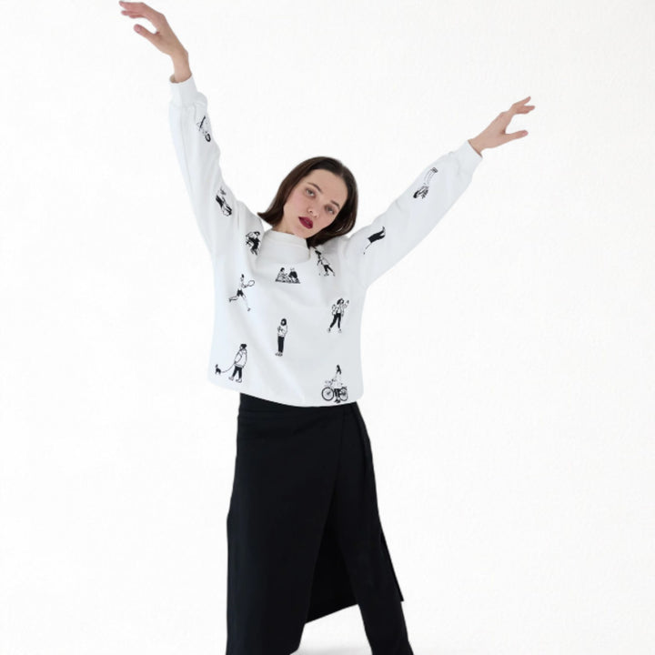 White heavyweight jumper with people embroidery