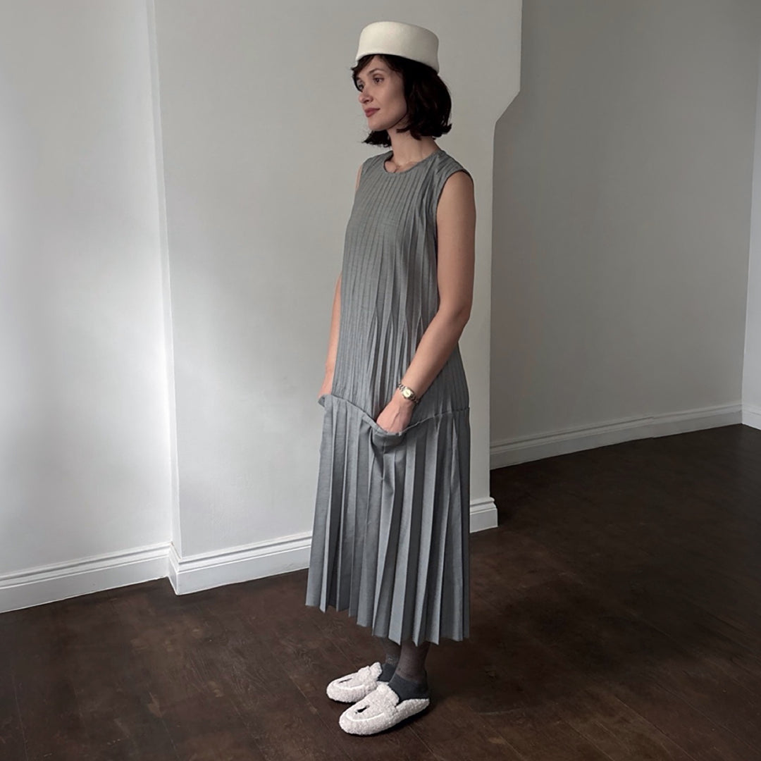 Beige shearling mules with embroidery patches