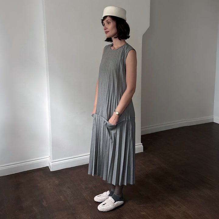 Beige shearling mules with embroidery patches