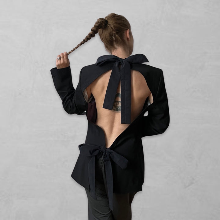 Reworked black blazer with open back and black bows