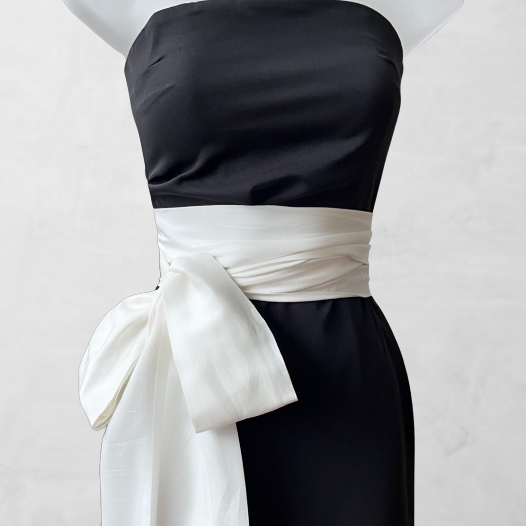 Black strapless dress with white ties