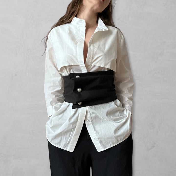 Black wide asymmetrical belt with pearl buttons