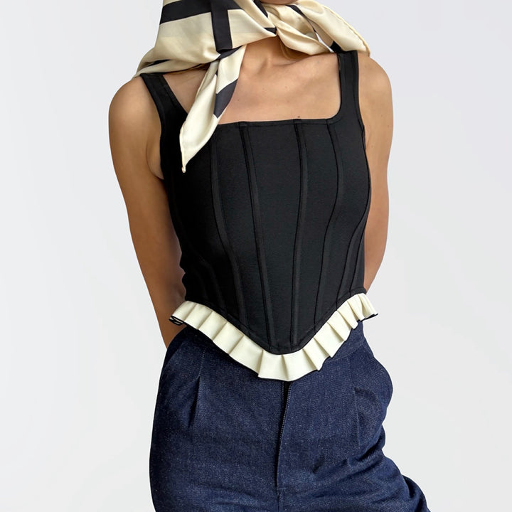 Black rib knit corset top with ruffle