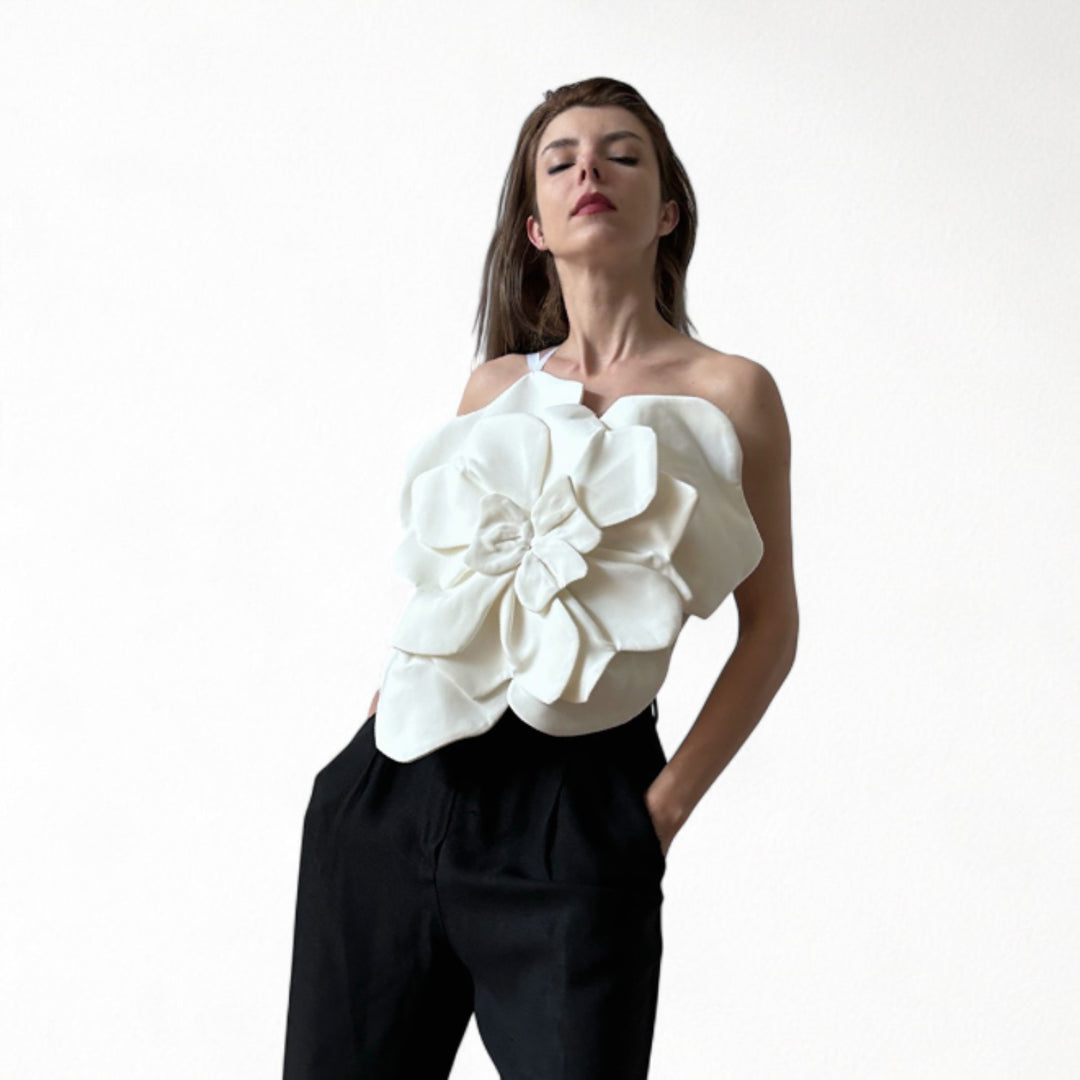 White flower top with asymmetric strap and criss cross back