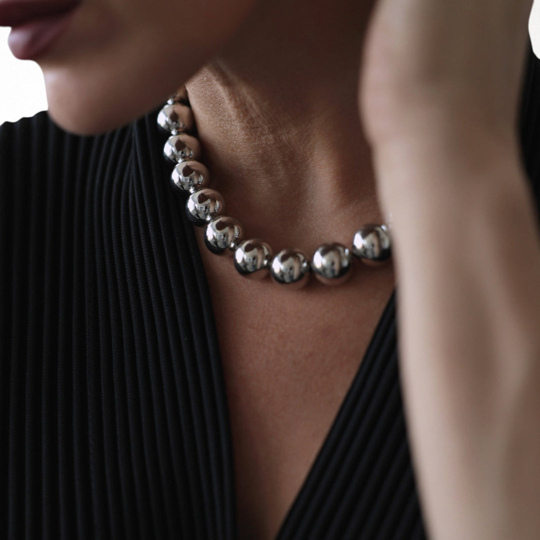 Silver string beaded necklace