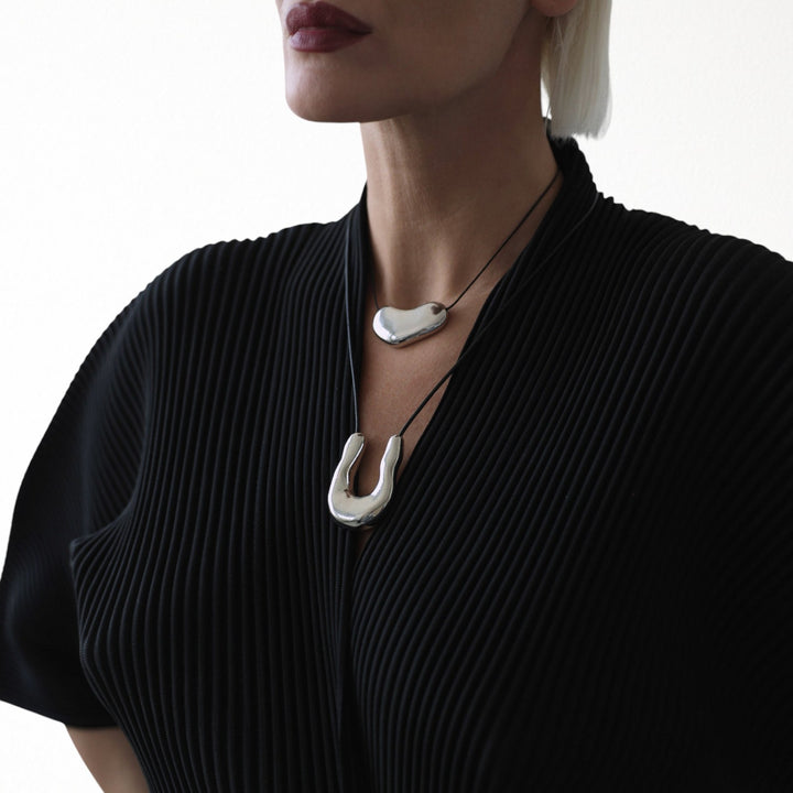 Silver bean geometric pendant necklace