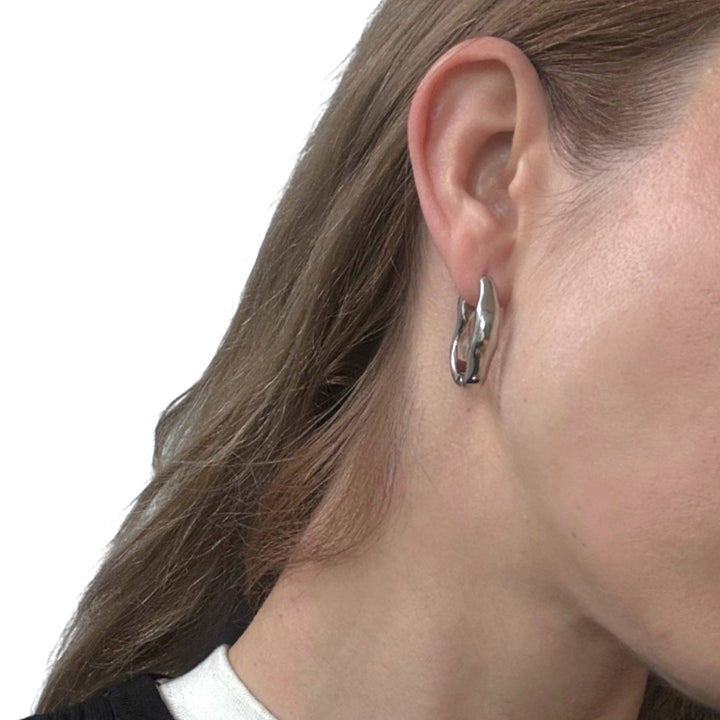 Minimalist asymmetric silver hoop earrings