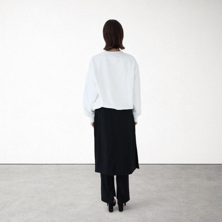 White heavyweight jumper with people embroidery