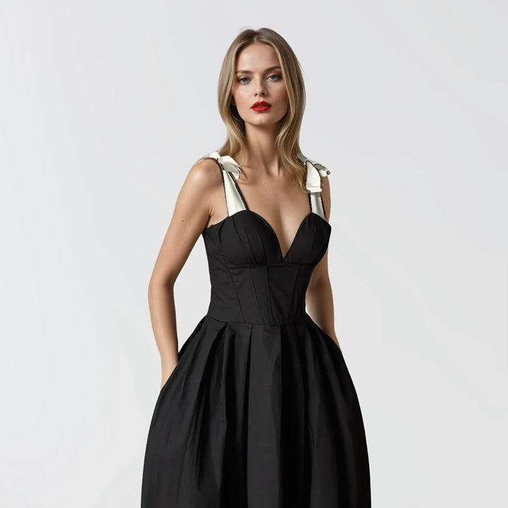 Black corset dress with contrasting trap ties