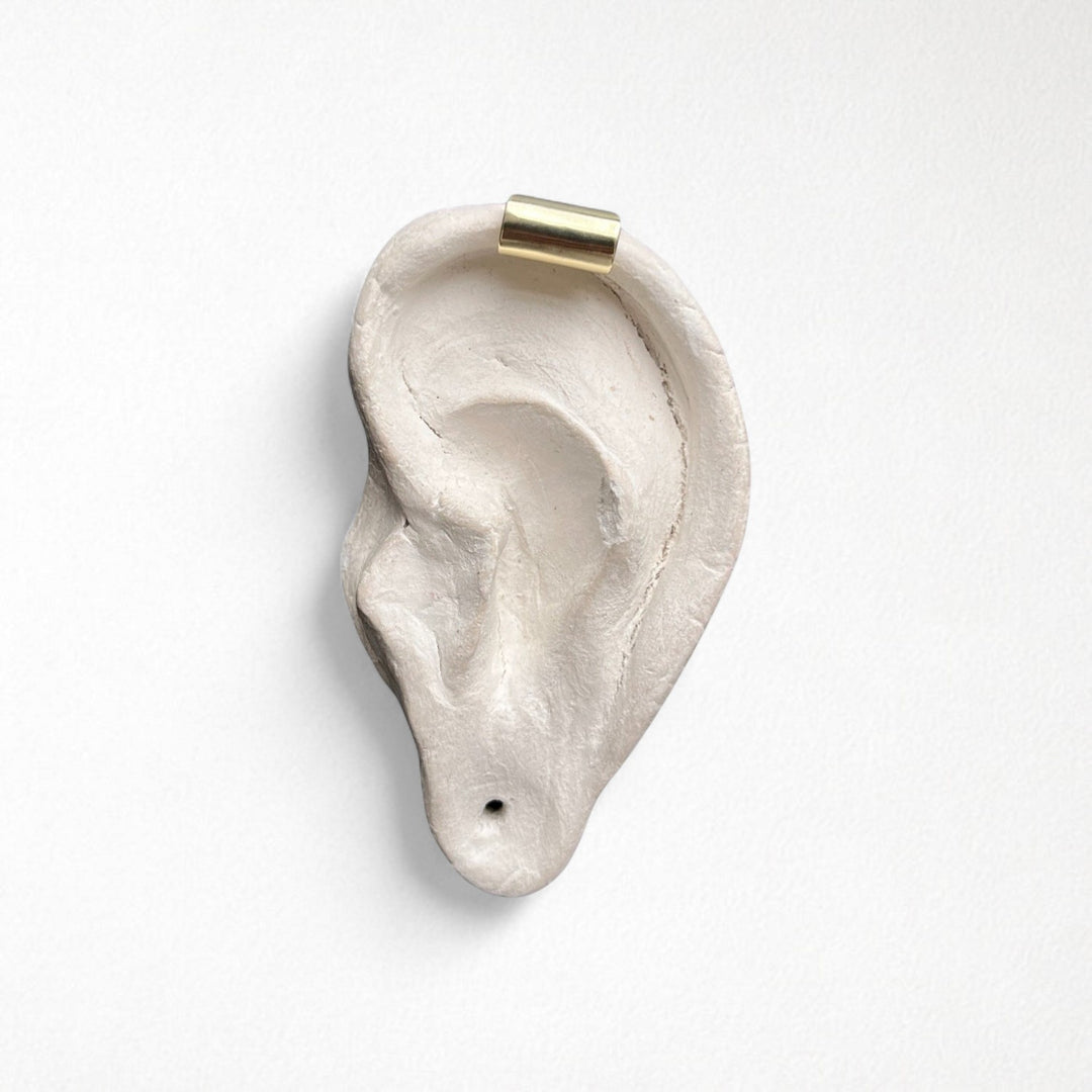 Gold earlobe cuff earring one piece