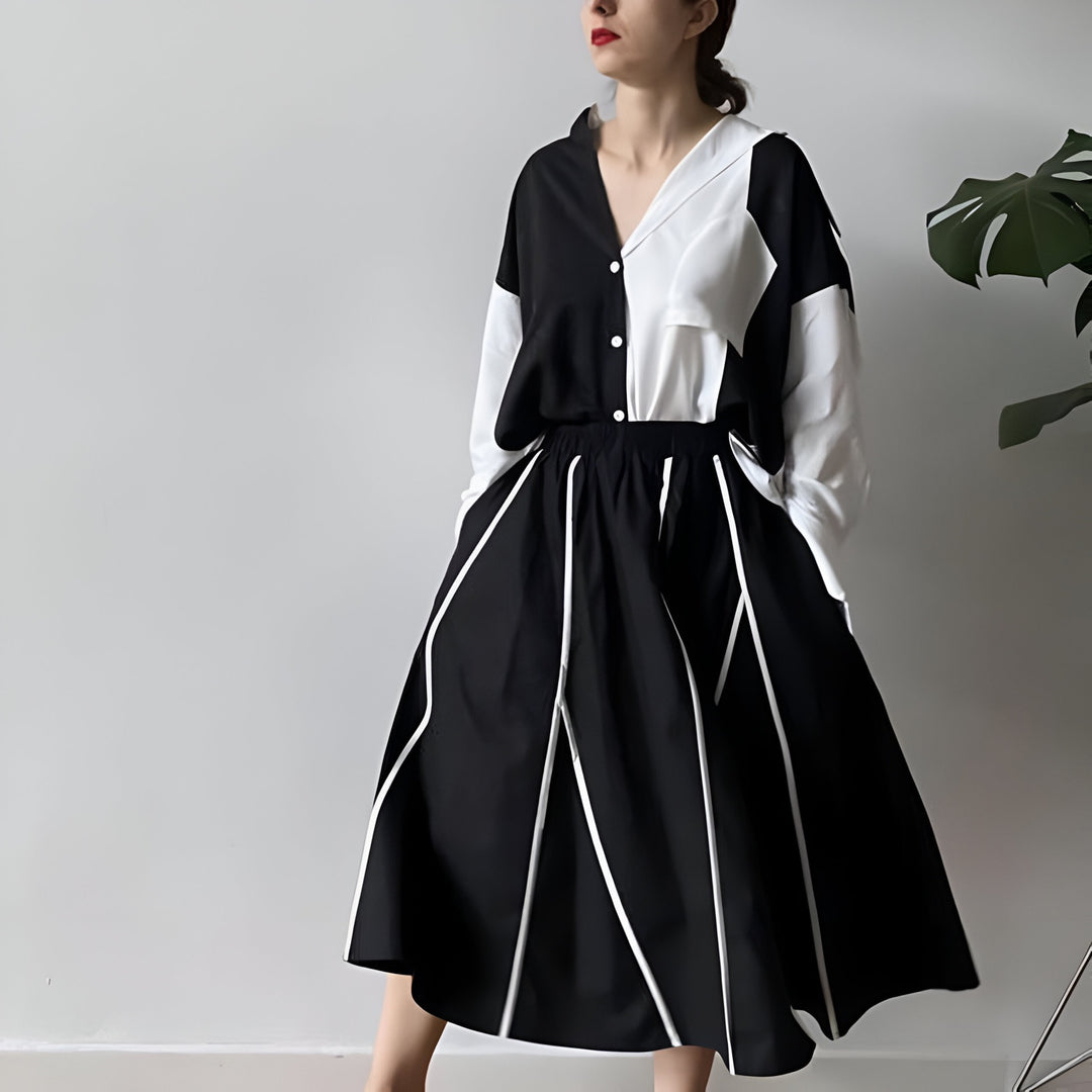 Black full skirt with panels and white contrast tape