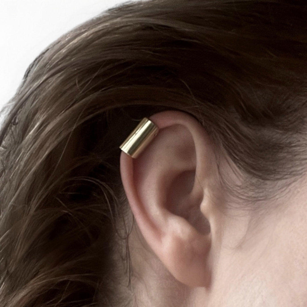 Gold earlobe cuff earring one piece